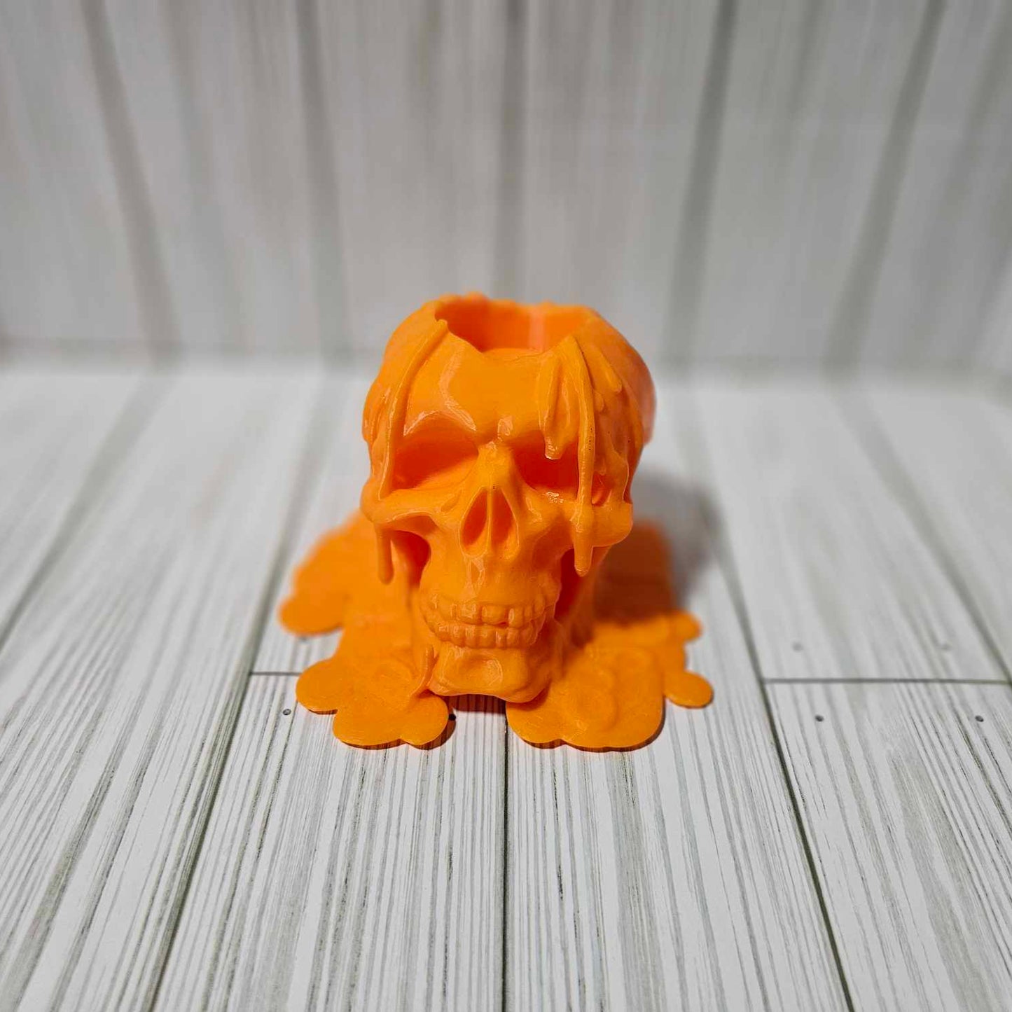 Melting skull tealight candle holder